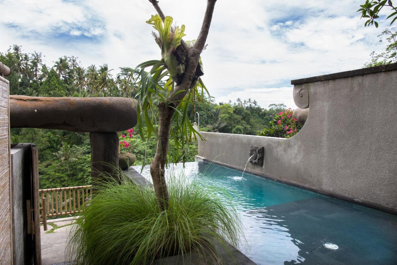 Kastara Resort Ubud Exterior foto A swimming pool in Bali, Indonesia